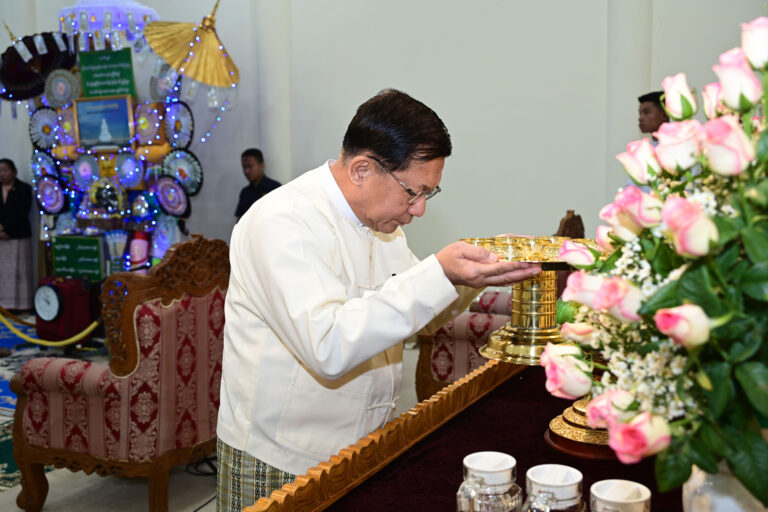 Min Aung Hlaing flaunts Buddha riches